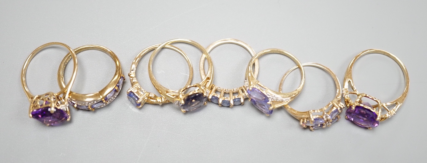 Six assorted modern 9ct gold gem set rings, including amethyst, gross 13.9 grams, a similar 14ct gold ring, gross 2.5 grams and a 925 ring.